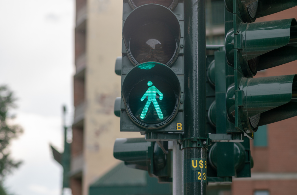 Image of walk symbol in crosswalk